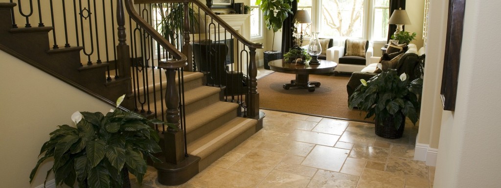 Luxury home hallway with a tiled floor.